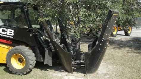 skid steer tree digger|skid steer digger attachment.